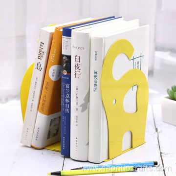 cute cartoon desk with elephant bookends collects arranges